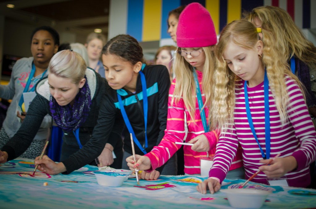 Girls painting the mural, G Day Toronto, 2015